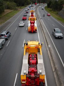 Truck convoy showing barnes fleet